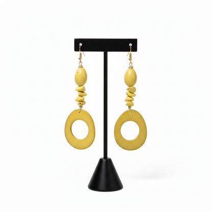 Yellow Tagua Nut Earrings with Black Display Stand